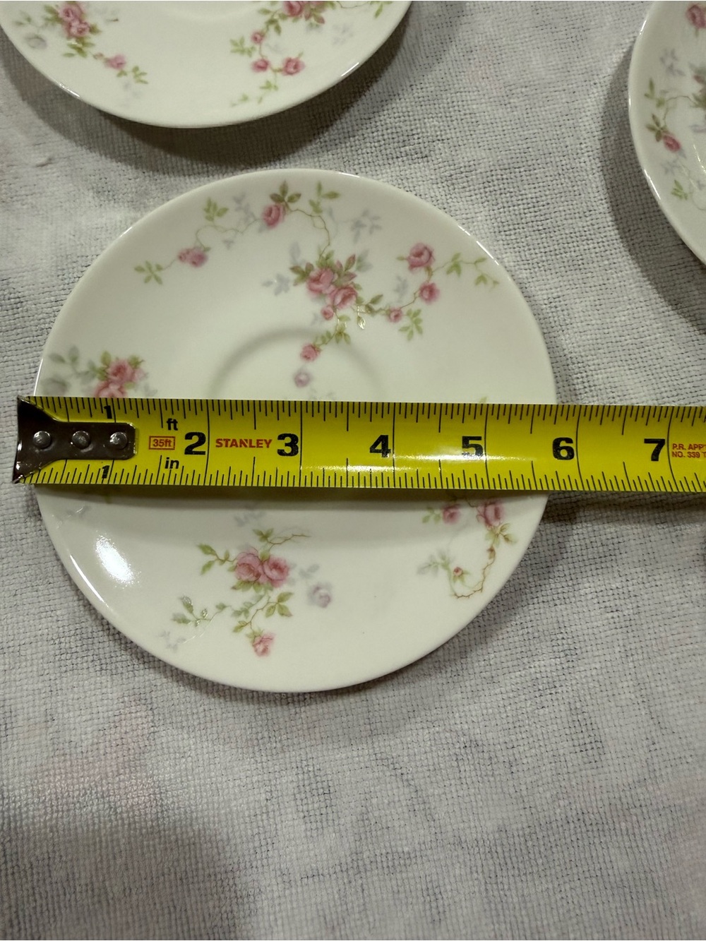 Fine White Porcelain Saucer with Pink Floral Pattern